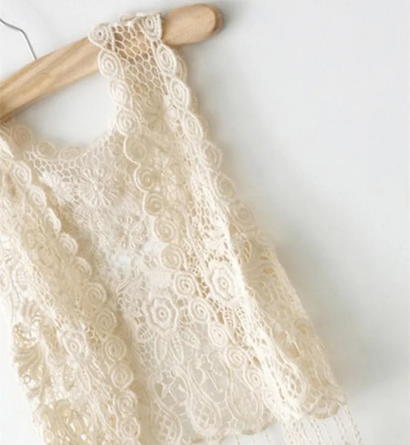 Модный женский вязаный жилет с коротким рукавом кисточками однотонный бежевый