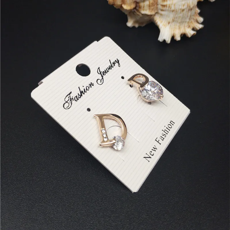 Серьги женские из натурального розового золота с цирконием фирменный дизайн