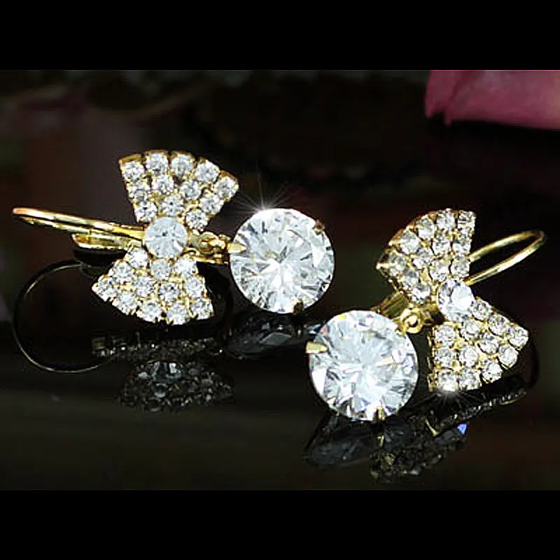 Белые серьги с павлиньими звездами луком и австрийским кристаллом CSE118|earrings austrian