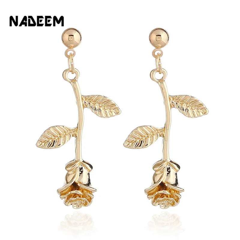 Женские серьги гвоздики NADEEM из металла золотистого/розового золота/серебристого