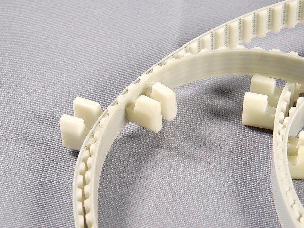 

Foshan good quality AT10+ stopper steel code transmission belt