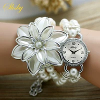 shsby fashion women rhinestone watches ladies pearl strap many petals flower bracelet quartz wristwatches women dress watches