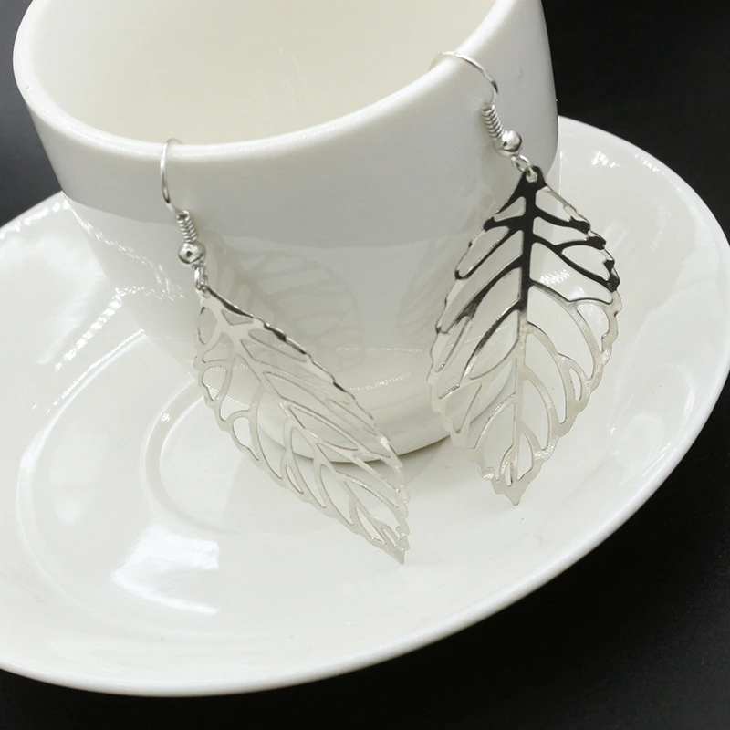 Женские серьги Популярные Модные ювелирные изделия полые металлические листья