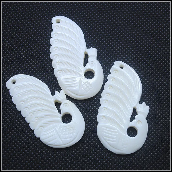 

2pcs nature bone beads bone pendants peacock white beads pendants new carving unique beads wholesale size 43x22mm