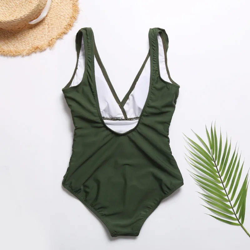 Женский цельный купальник зеленый глубокий v-образный вырез с открытой спиной