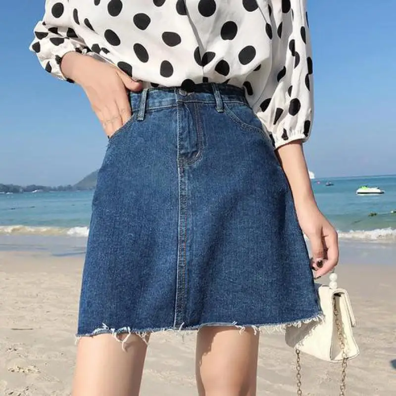 

Модная синяя джинсовая юбка Zuolunouba с завышенной талией, Женская однотонная трапециевидная юбка на пуговицах выше колена, женские мини-юбки в...
