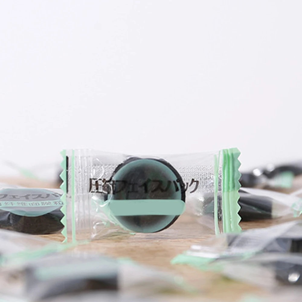 Горячая продажа 30 шт Черная сжатая маска одноразовая черная для лица бумага уход