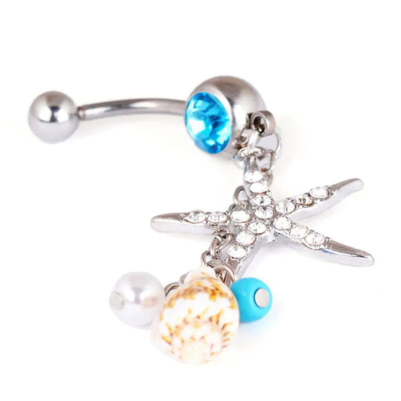 Кольцо с кристаллами в виде морской звезды и раковины-подвеска для пупки