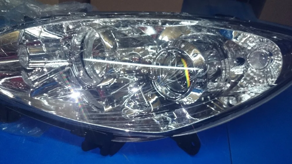 Детали кузова головной свет LampAssembly haima 2 2009-2012 правая сторона OEM: MA10-51-030F |