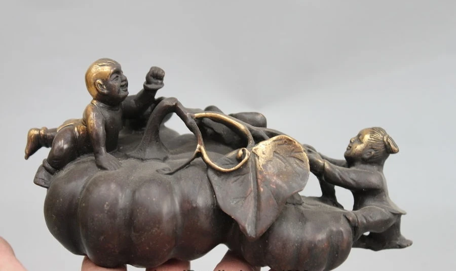 

Chinese Feng Shui Bronze boy girl child picking pumpkin Attract Wealth Statue