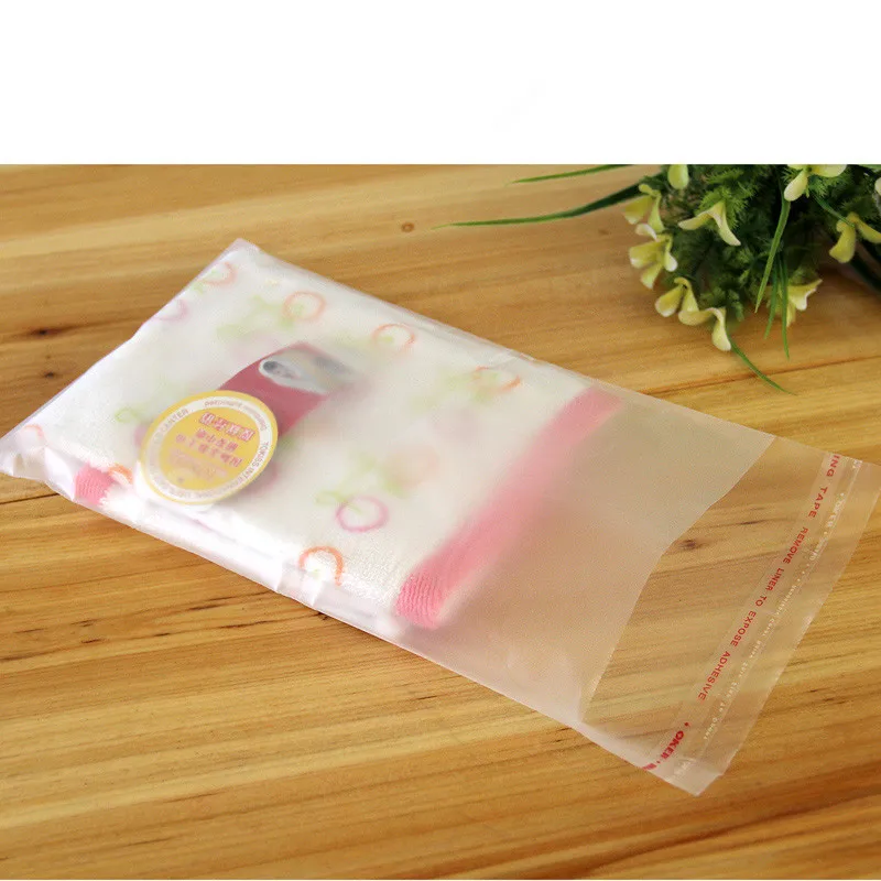

Retail 200Pcs/Lot 9 Sizes Transparent Plastic Bags Ornaments Cellophane Clear Matte Self Adhesive Seal OPP Poly Package Bags