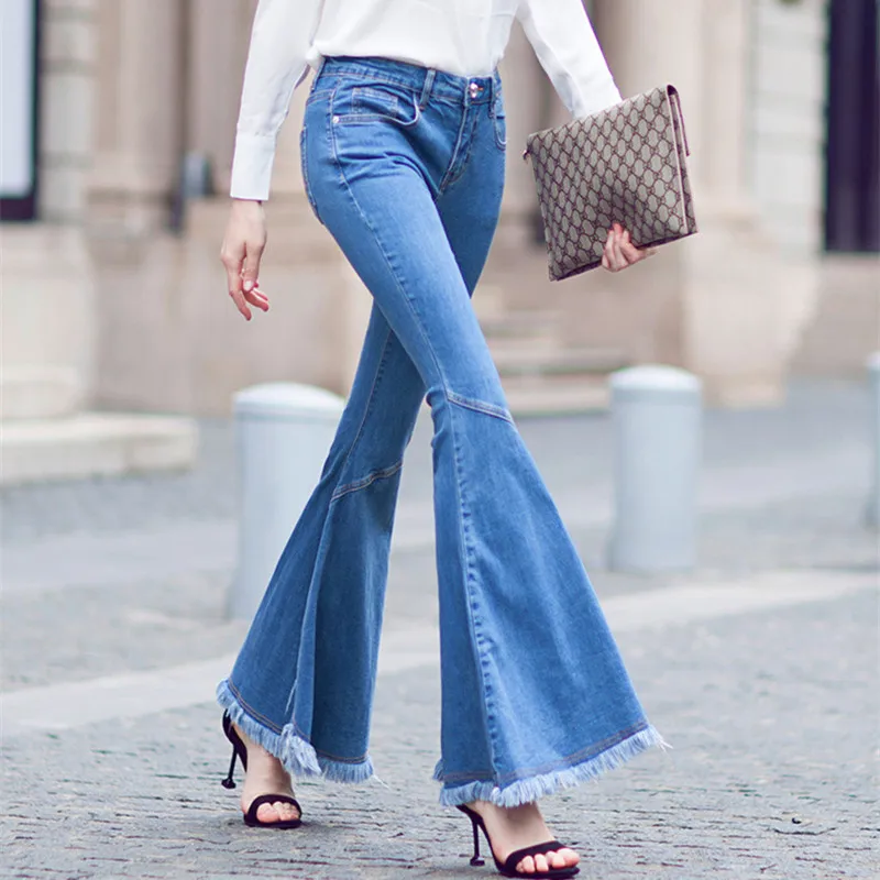 Free Shipping 2020 Stretch Fashion Long Jeans Pants For Women Flare Trousers Plus Size 25-30 Denim Summer Tassel Jeans With Slit