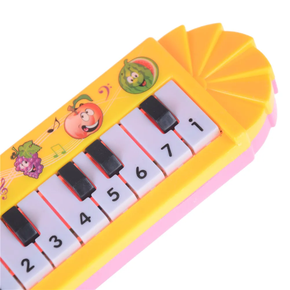 

1pc fashion Mini Plastic Keyboard Electronic Musical Piano Instrument 5.5cm*18.5cm Kid best toy