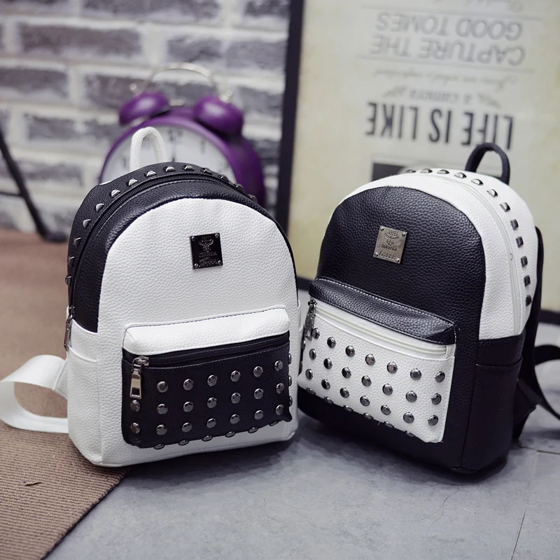Новинка 2017 г. дизайнерские черные белая кожа заклепки рюкзак школьные сумки для