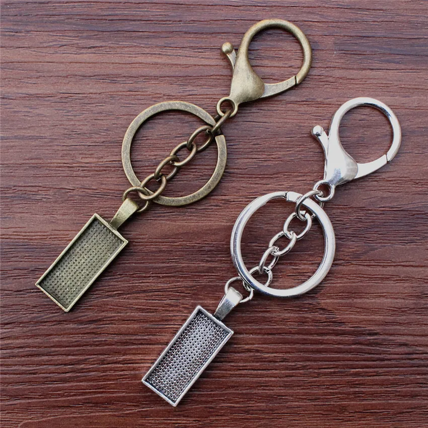 

Fit 10x25mm Rectangle platina plated/bronze Handmade Key rings buckle Cabochon Frame Bezel Settings Tray blank 5pcs/lot K05483