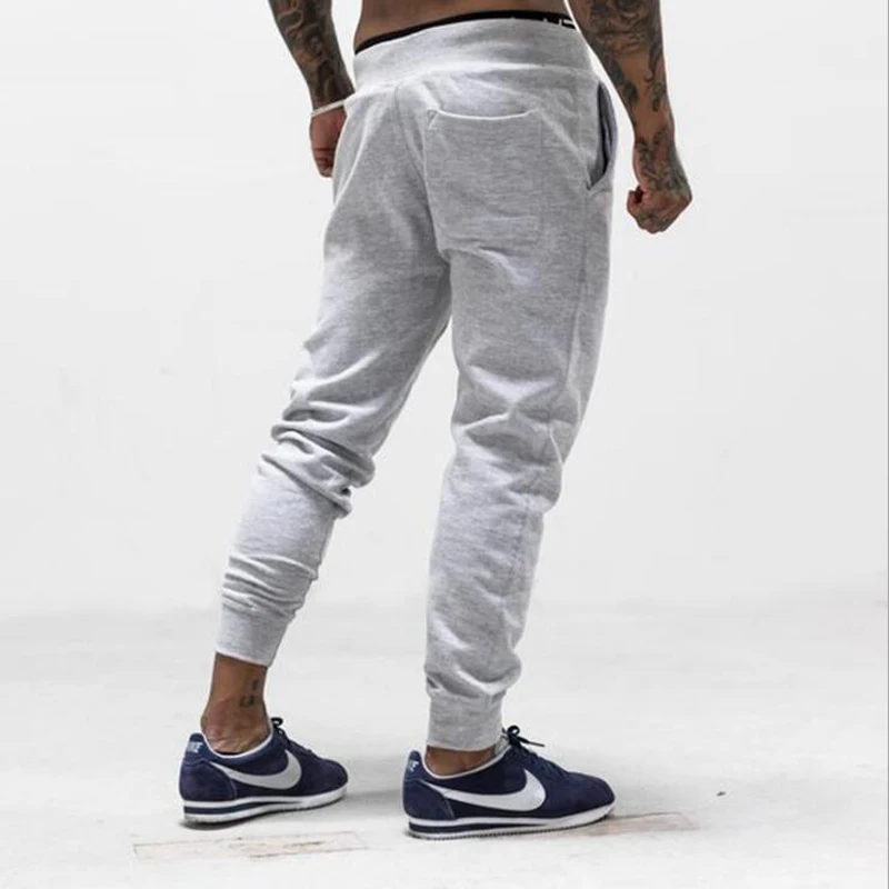 2015 Новый Мужчины Брюки SportsRunning SoccerPrinting Jogger Штаны Бодибилдинг Фитнес спортивные |