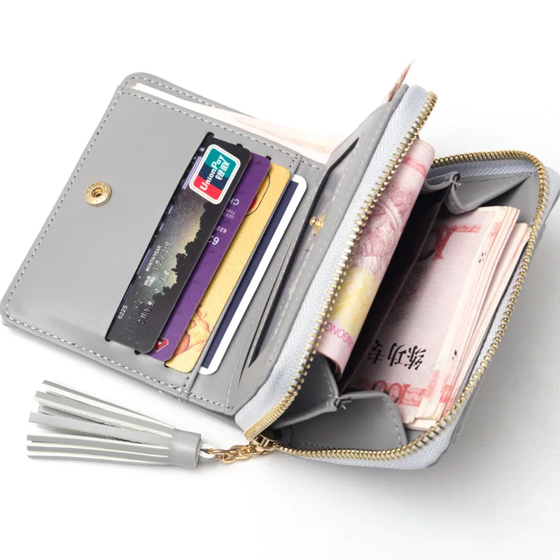 Женский кошелек с кисточками розовый короткий из мягкой искусственной кожи