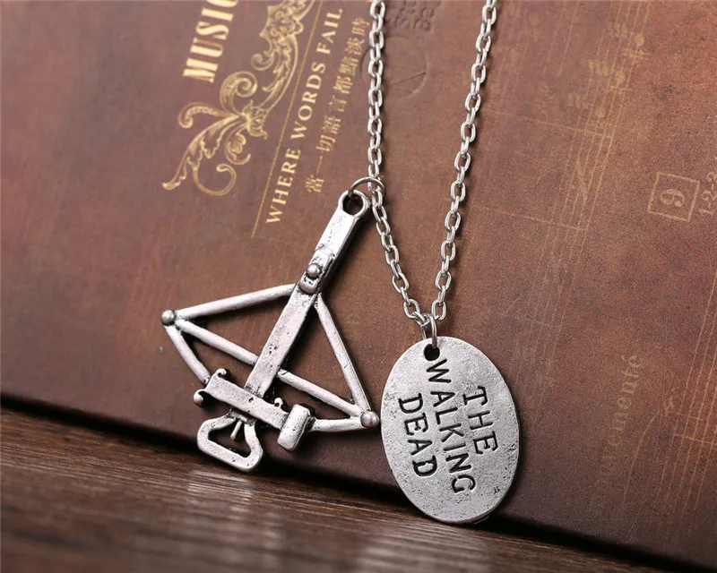 

NEW Wholesale 10pcs/Lot The Walking Dead Daryl Bowman Bow Arrow Necklace fashion Pendants necklace