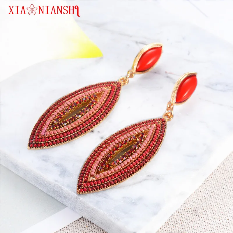 

XIAONIANSHI New fashion originality big eyes&mouth&maple leaves shape resin beads earring women earrings drop jewelry best gift