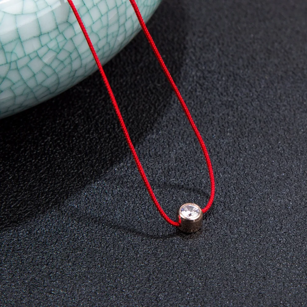 AMOURJOUX браслет с красной нитью золотого цвета 316L нержавеющая сталь прозрачный кубический циркон браслеты с подвесками для женщин красный браслет