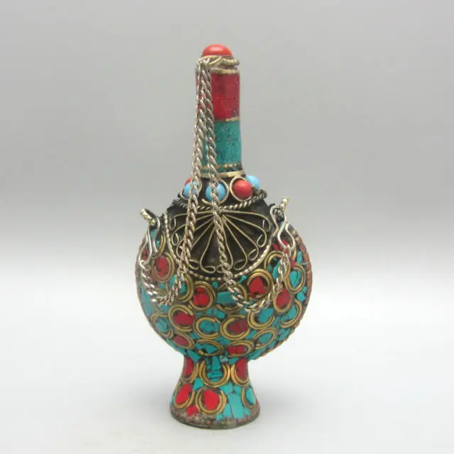 

Elaborate Chinese handwork Tibetan Silver Inlaid with Artificial Turquoise and Colorful Beads snuff bottle