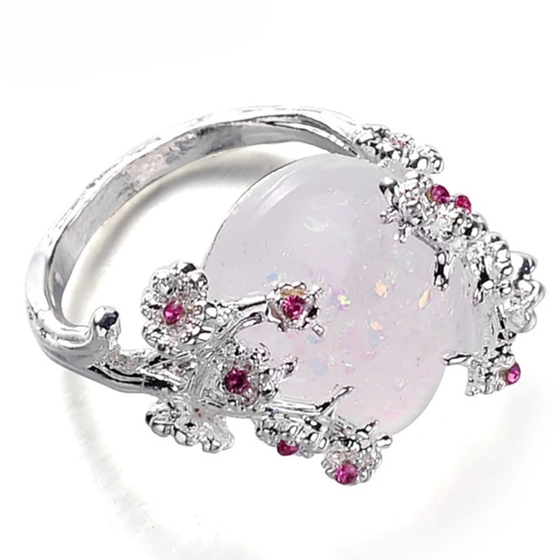 Женское кольцо с крупным белым огненным опалом и фианитом|Кольца| |