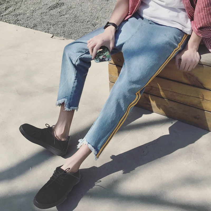 2018 осенние новые джинсы мужские тонкие модные потертые слезы старые джинсовые