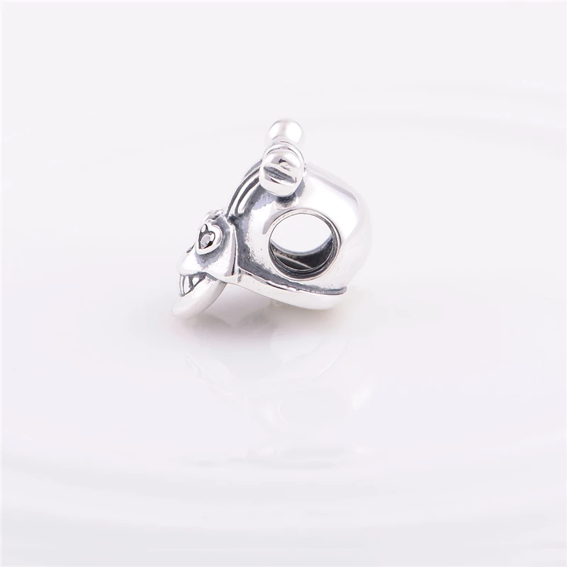 Серебряный шарм 925 пробы на браслет в виде черепа со стразами и бантиком.|skull