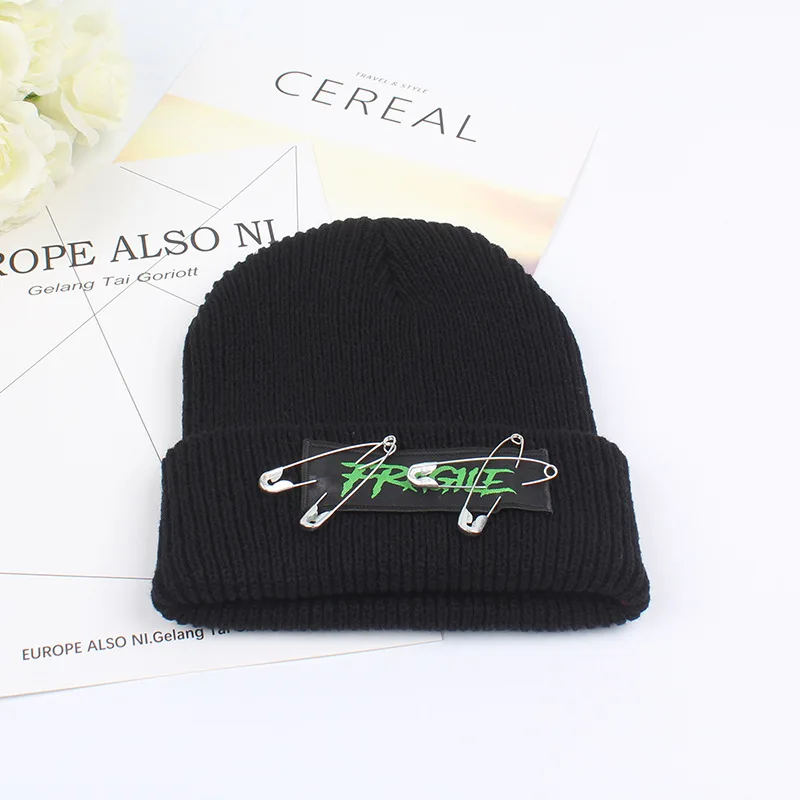 pin cold hat European and American knitted cap wool men's women's movement winter warm hip hop hat. |