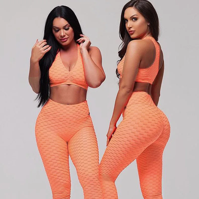 

2020 spot the European and American fashion sexy midriff pencil feet pants two-piece dress Pure color knitted suits Women Tracks