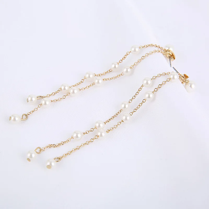 Женские двухрядные длинные серьги с кисточками выполненные вручную в