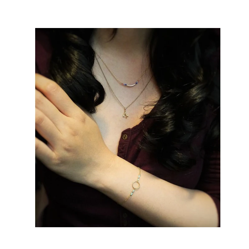 Браслет со сверкающими зелеными бусинами из семян кармы золотистый мерцающий