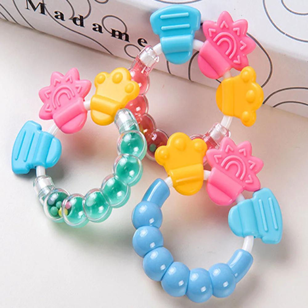 

Round Silicone Teether Educational Teething Toys Toddler Cartoon Jingle Bell Toy Rattles Teeth Training Dental Care Baby Teether