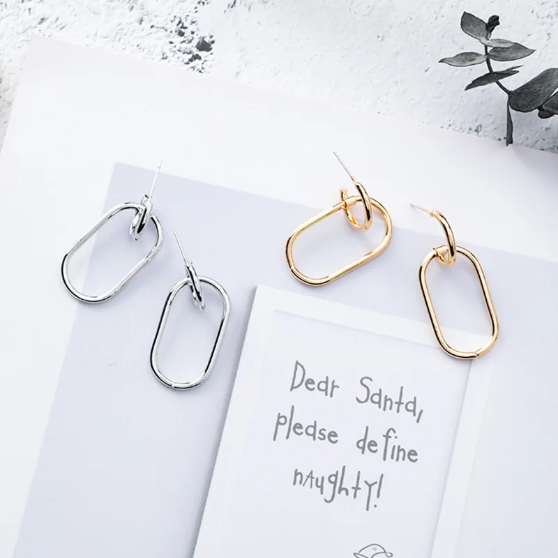 Металлические эллиптические серьги-кольца с геометрическим рисунком | Украшения