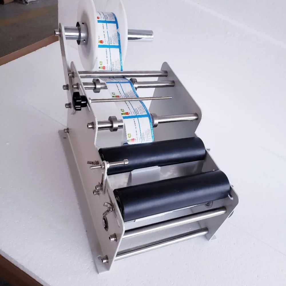 YTK-L100 handheld manual round bottle labeling machine for bottle,Manual Hand Operated Labeling Machine