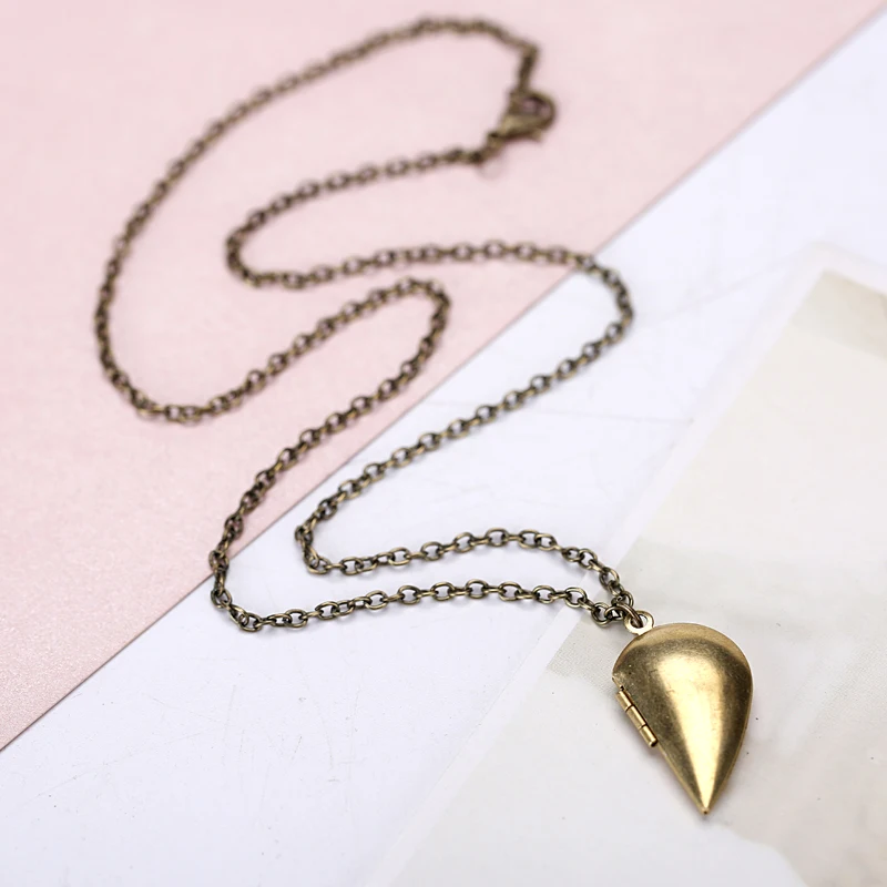 Два бронзовых полулюбовных ожерелья подарят вам другую половинку или лучшее