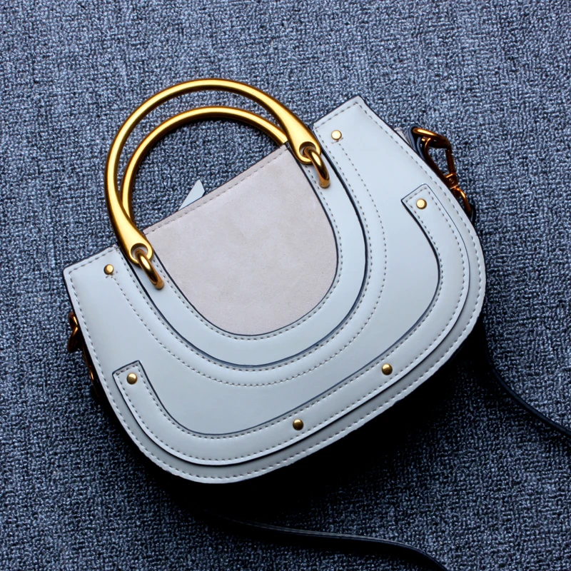 

new vintage saddle bags with cow leather ring Hand bill of lading straddling Genuine First Layer Cow Leather Women Bags