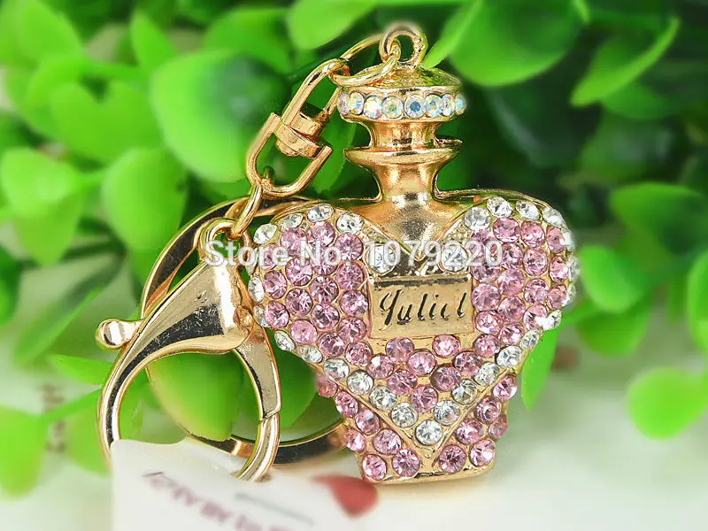 духи флакон со стразами сваровски. духи со стразами на флаконе. круглые синий флакона. Britney spears fantasy духи. духи флакон с колечком.