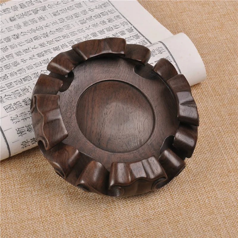 Черная основа из палисандра или эбенового дерева круглая для деревянных бревен