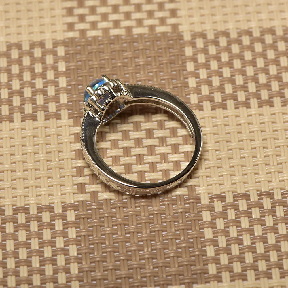 Weinuo кольцо с голубым огненным опалом и белым кристаллом из стерлингового серебра