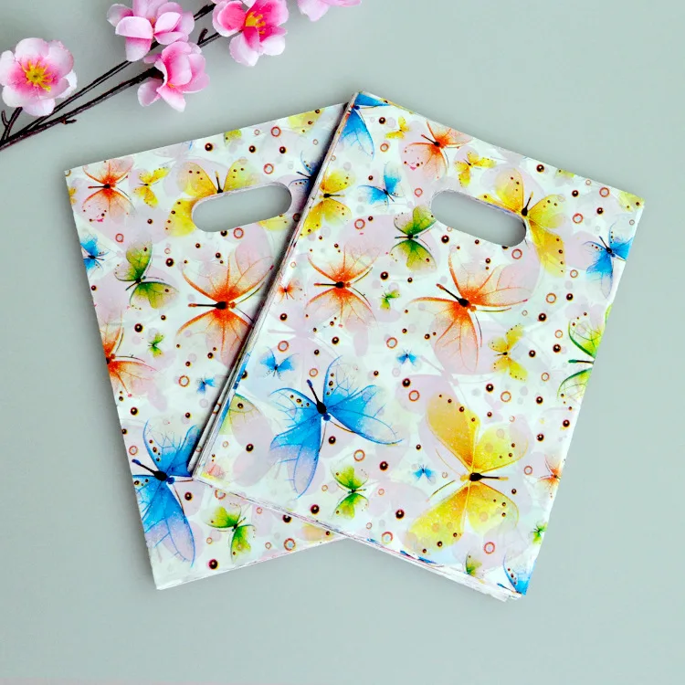 

High quality 200pcs Plastic Gift Bags Jewelry Shopping Bag 15x20cm Colorful Butterfly Birthday Plastic Packaging Wedding Favor