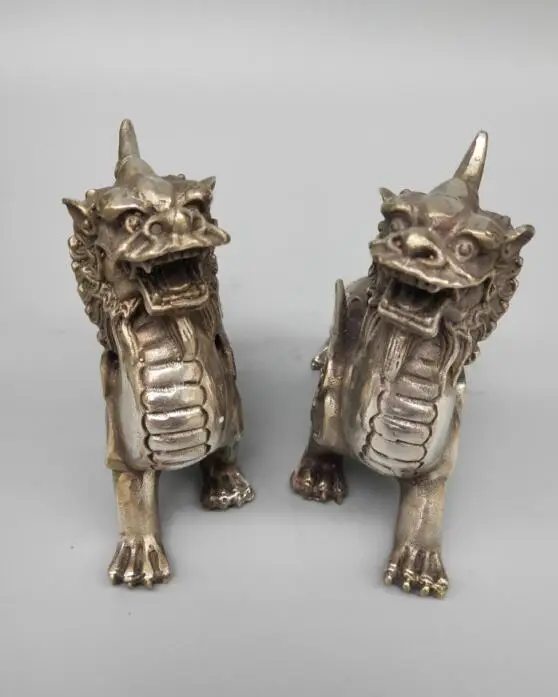 

Chinese white copper double wing unicorn a pair
