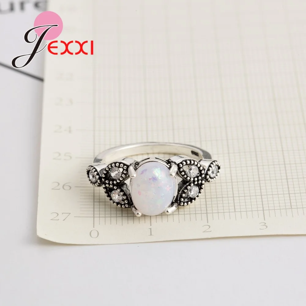 Женское кольцо из серебра 925 пробы с белым огненным опалом | Украшения и