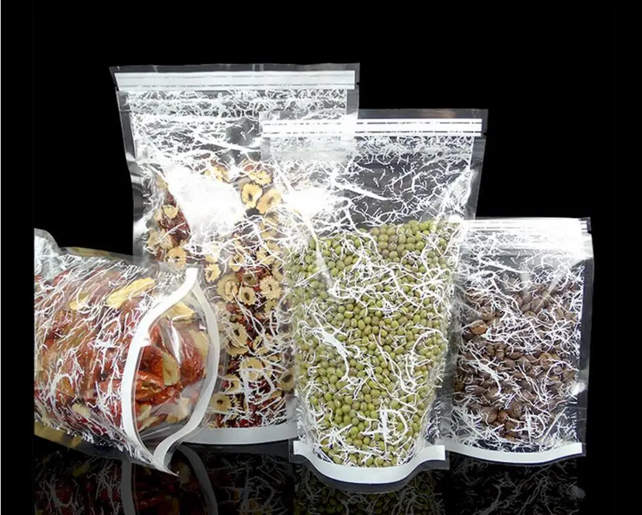 

0.15mm 100PCS High-grade Three-pattern Dried Fruit Stand-up Bag Candy Snack Sealing Zipper Packaging Bag