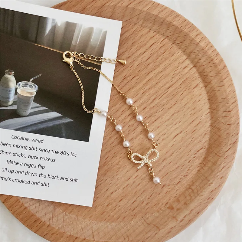 Женский браслет с бантиком и жемчужной цепочкой золотой для подруги новинка 2019 |