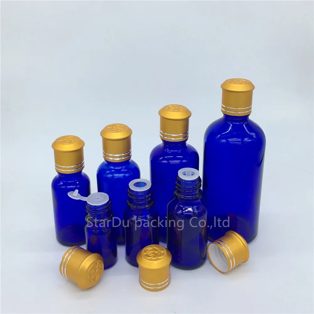 

5ml 10ml 15ml 20ml 30ML 50ml 100ml blue Glass Bottle, blue Vials Essential Oil Bottle with Decorative pattern cap 500pcs/lot