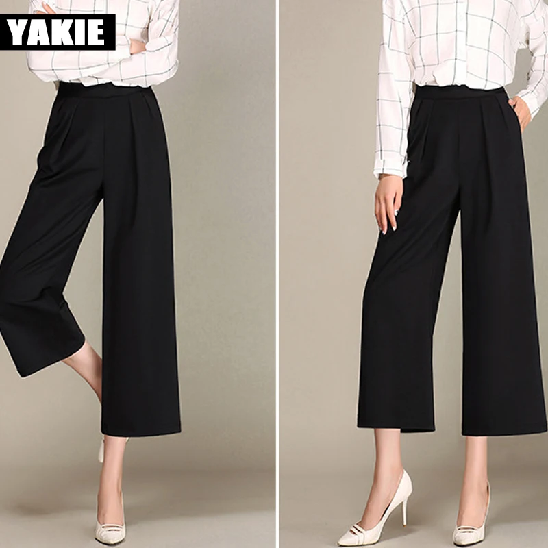 Брюки женские черные белые широкие с высокой эластичной талией в стиле пэчворк