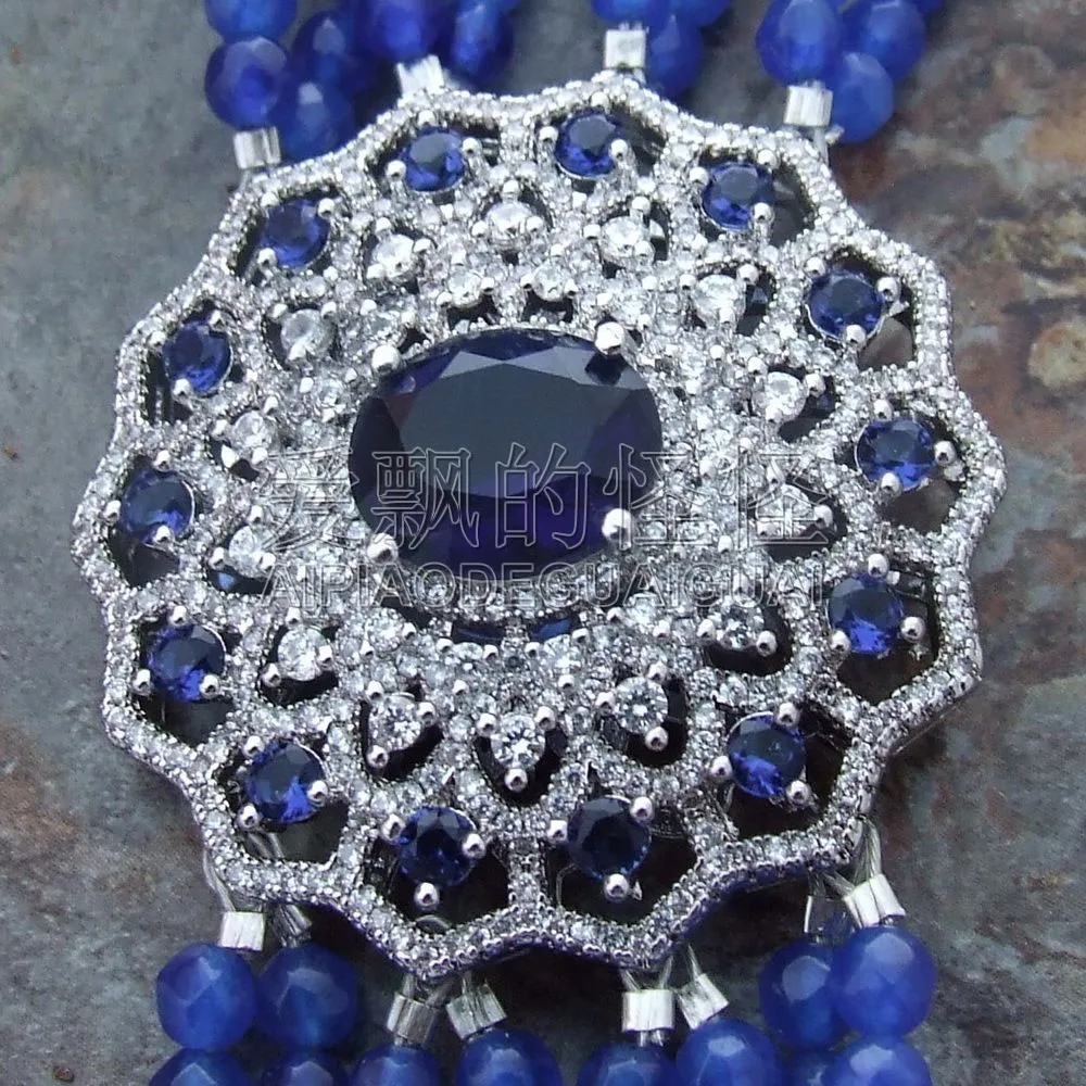 

Women's 8" 8 Strands Round Faceted Blue Bracelet CZ Connector