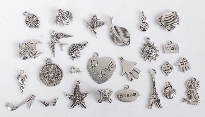 

FREE SHIPPING 104PCS Mixed Lots of Antiqued Silver Color Metal Charms #24313