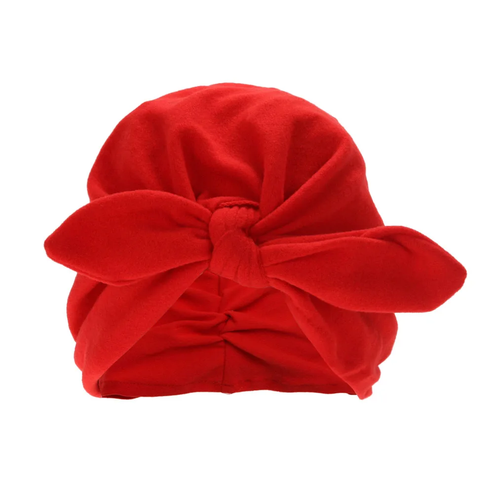 Зимняя детская шапочка теплая мягкая шапка с бантом и кроличьими ушами